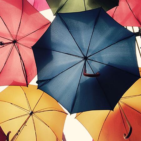 Umbrellas in sky