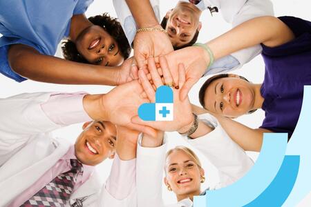 medical professionals in a team huddle