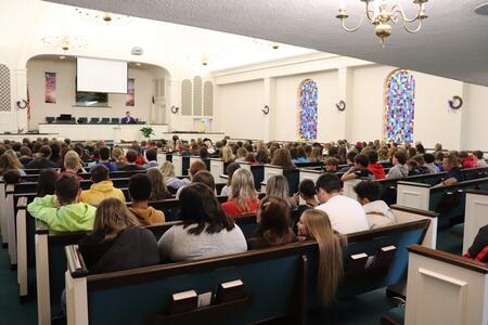 Over 200 youth sitting together at the eighth grade teen conference.