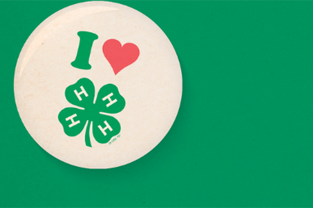 white circle on green background with "I heart 4-H"