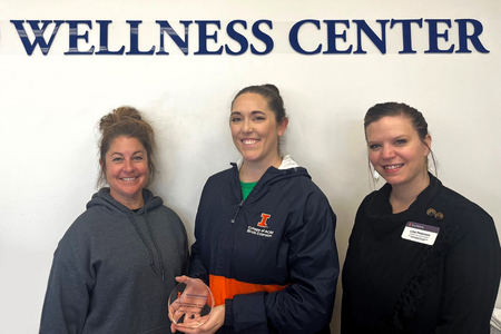 (left to right) Jen Lyles, JCH Wellness Center Fitness Coordinator, Jessica Jaffry and Lisa Peterson both from University of Illinois Extension present the fitness center with their award.