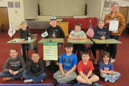 group of kids with 4-H flag