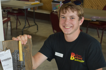 boy in black shirt smiling