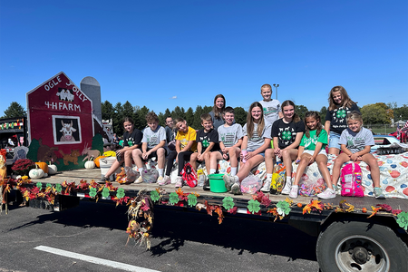 youth on a decorated trailer