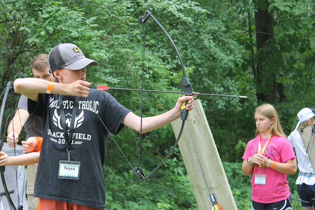 youth doing archery