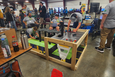Robotics team practices before competition.