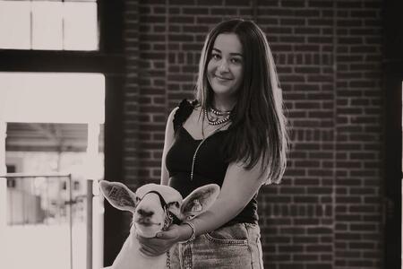 Kelsey showing a sheep