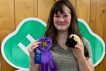 Autumn Rittenhouse with her guinea pig, Snickers