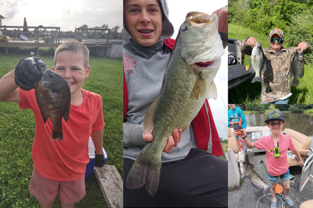 Fishing winners pose with winning catches.