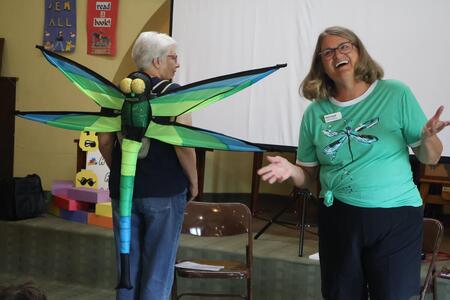 Volunteers showing dragonfly costume