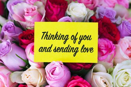 roses with a note Thinking of you and sending love.