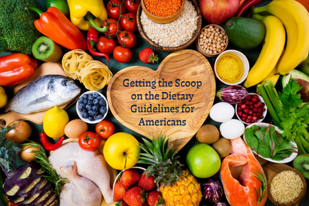 Proteins, fruits and vegetables on table with heart shaped bowl in center