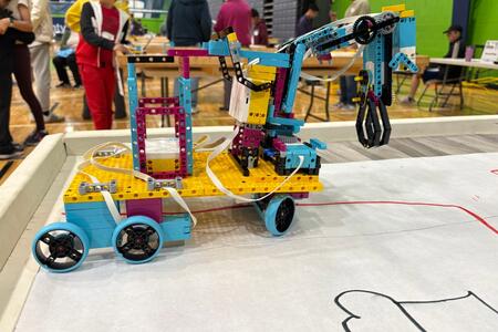 A robot made of brightly colored building bricks