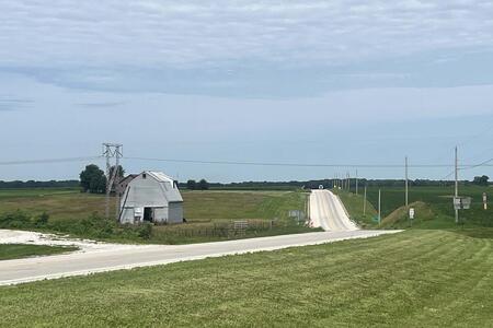 a barn and rural road