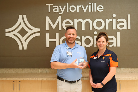 Lisa Peterson presents the 2026 Community Partner Award to Jay Boulanger.