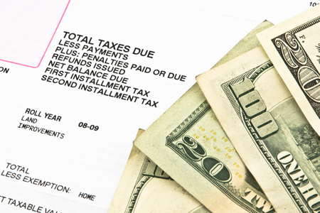 Property taxes and money displayed.