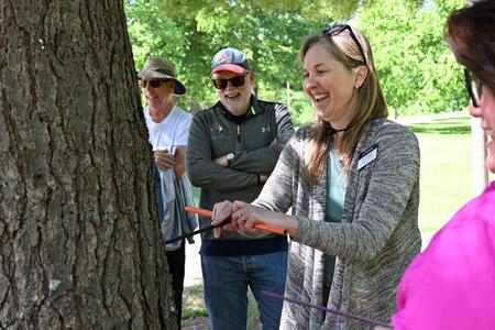 taking a core sample of a tree