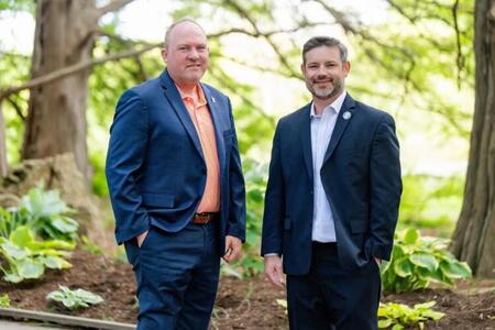 Rodney Johnson (ACES associate dean for research) and Matthew Vann (associate dean and Extension director) standing, left to right
