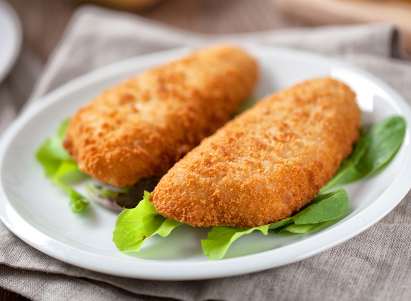 Breaded cod fish filets on a plate