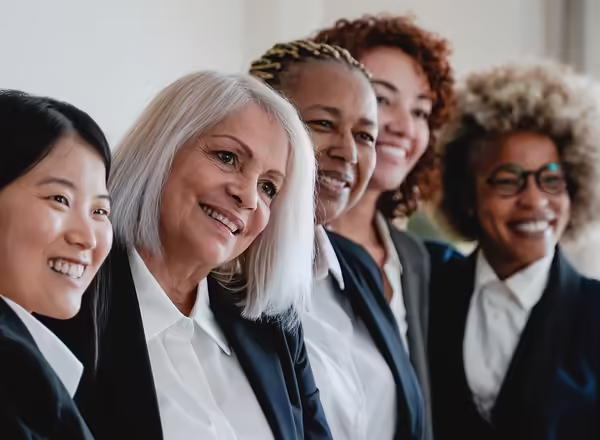 Multiracial business women having fun inside modern office
