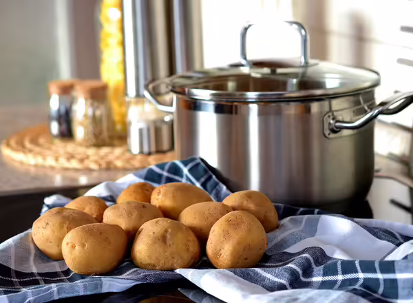 potatoes waiting to be boiled in pot