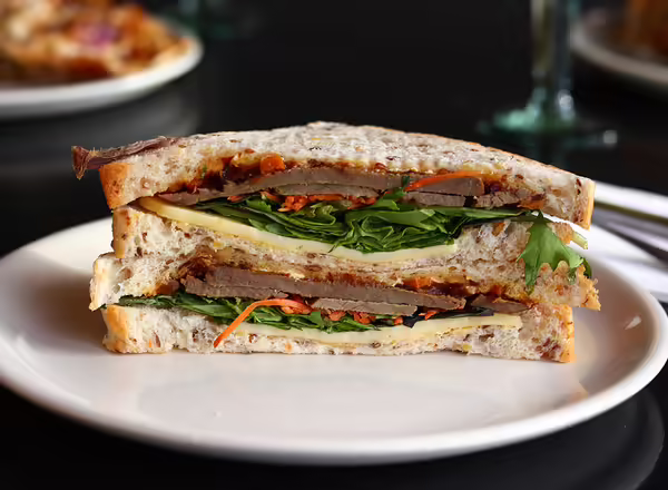 sandwich with meat and lettuce