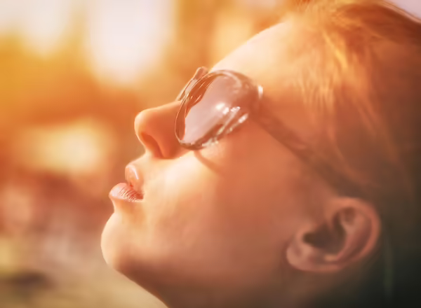 sunlight Vitamin D shining on person's face