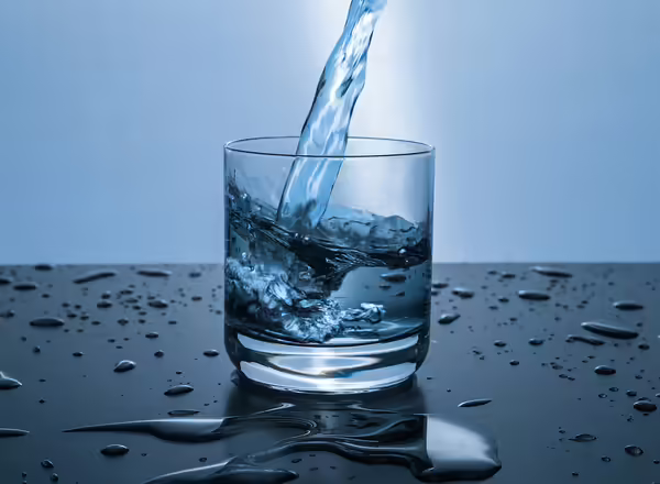 water pouring into a glass