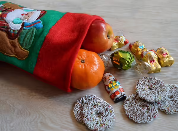 Christmas stocking with oranges and chocololate