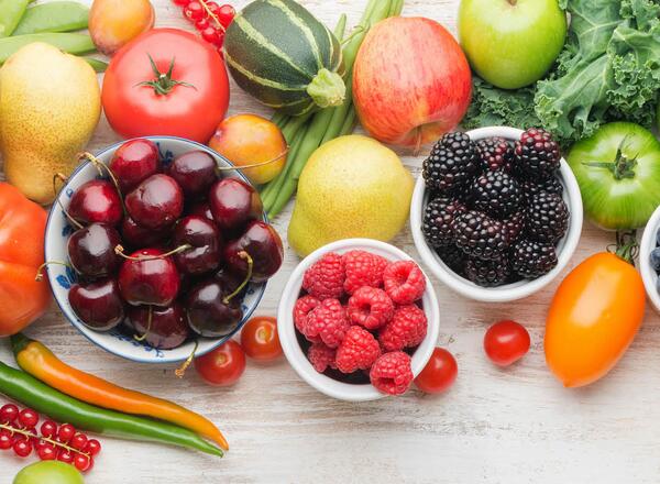 colorful fresh fruit and vegetables on counter