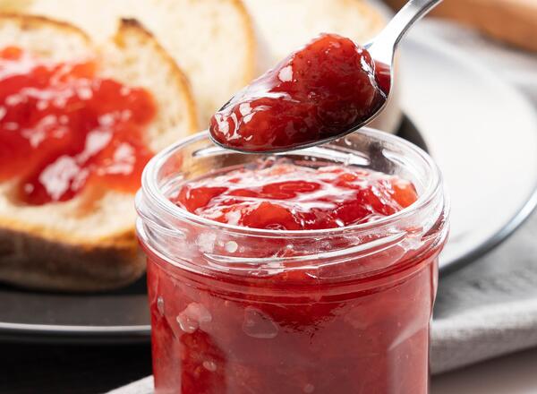 strawberry jam on spoon