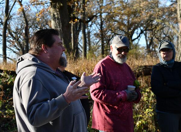 A man speaking to a group.