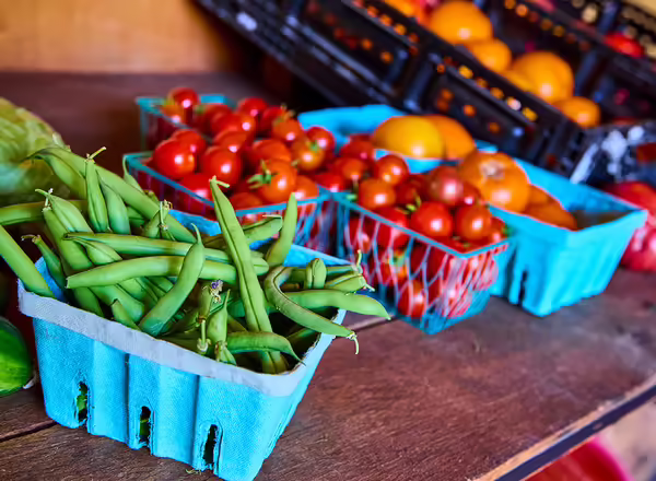 containers of fresh produce on shelf