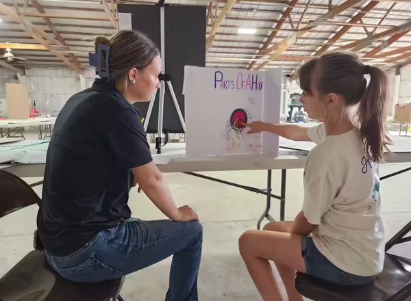 4-H youth getting judged