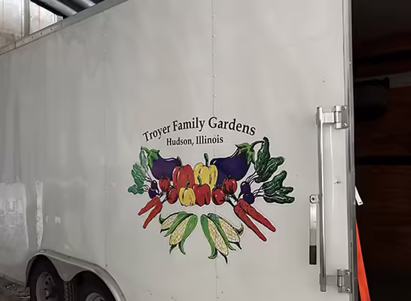 Troyer Family Gardens logo on a huge trailer