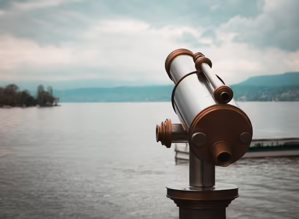 telescope overlooking water