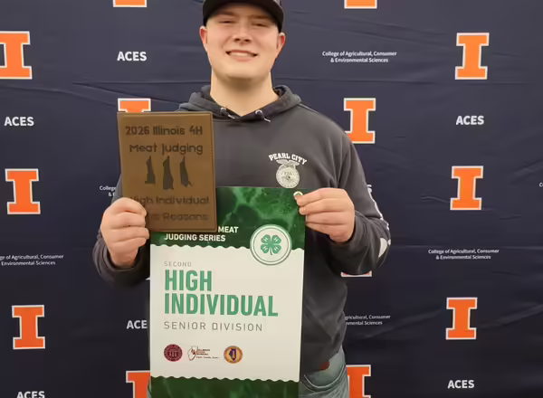 Brogan Keltner, Stephenson County 4-H member with his awards for meat judging