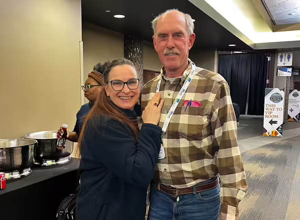 two people standing together