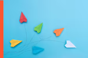 six paper airplanes in different colors