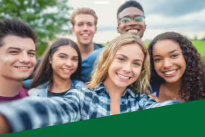 group of teens smiling at the camera
