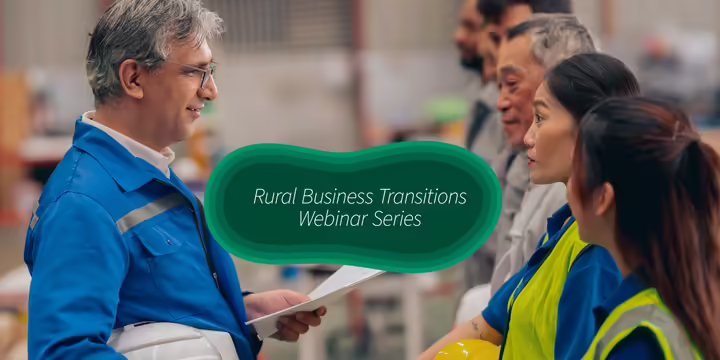 adults standing with hardhats