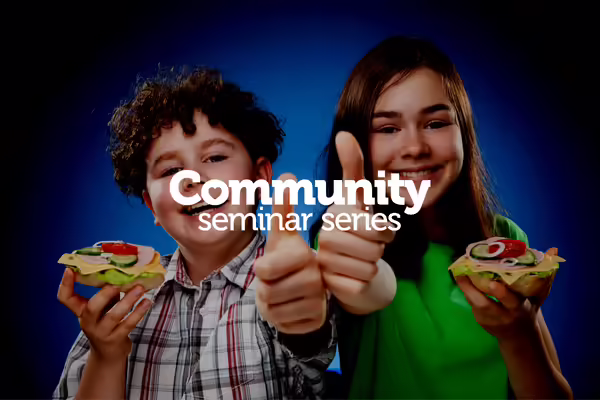 two pre-teens eating healthy snacks