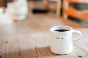 White coffee mug on wood table