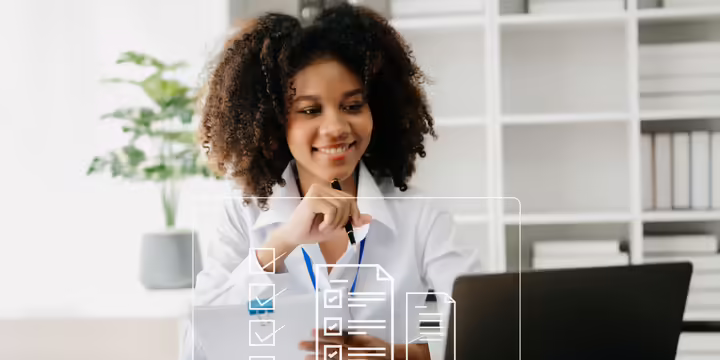 woman filling out form on computer