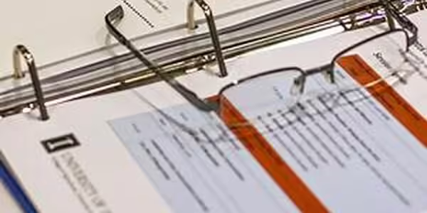 Paperwork and reading glasses