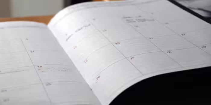 A white calendar planner book