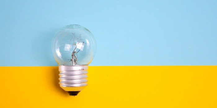 Photo of a lightbulb on a colorful background