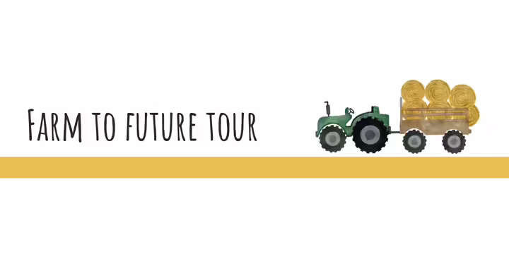 tractor with wagon full of bales