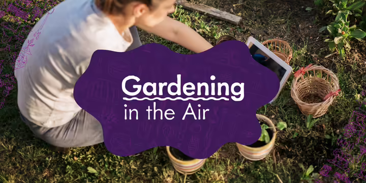 woman gardening while looking at an ipad for information