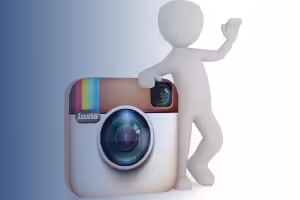 stick person next to a insta camera